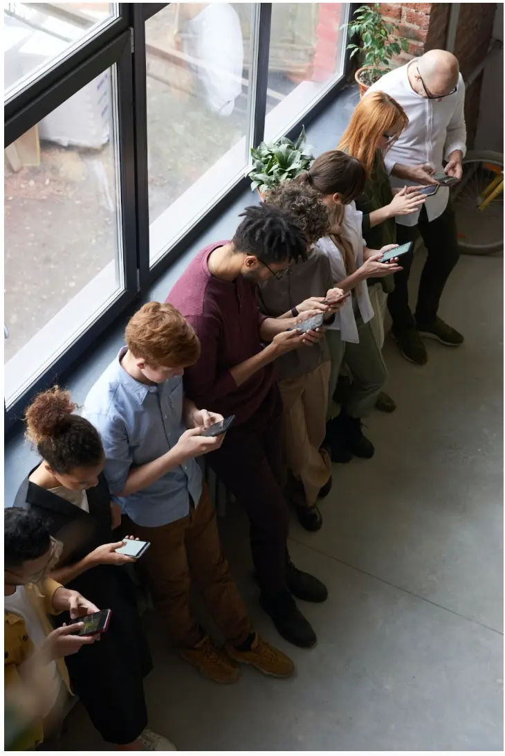 People Holding Their Phones