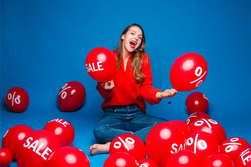 close-up-on-happy-young-woman-in-cardigan-and-jeans
