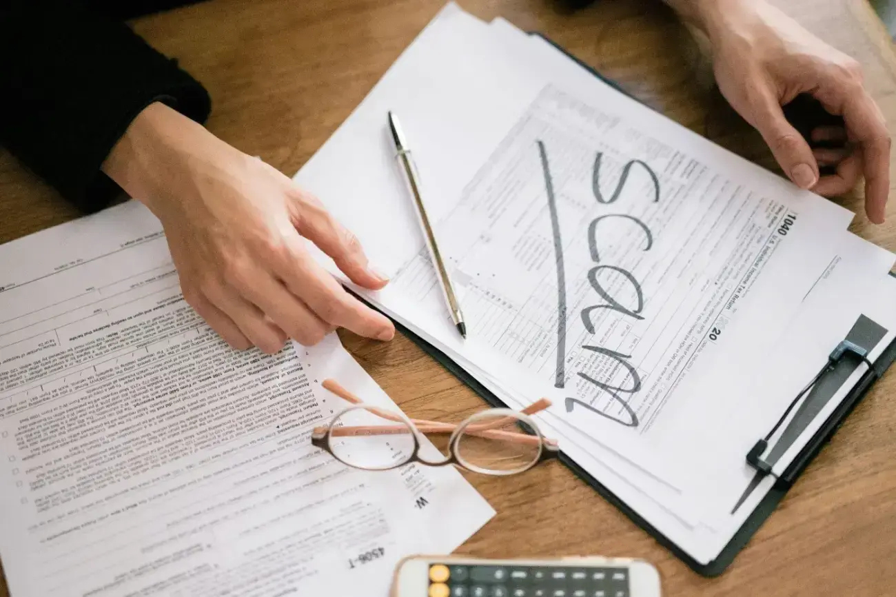 close-up-shot-of-a-person-holding-documents