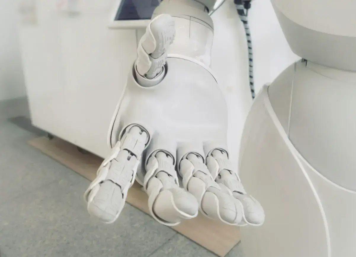 closeup-photo-of-white-robot-arm