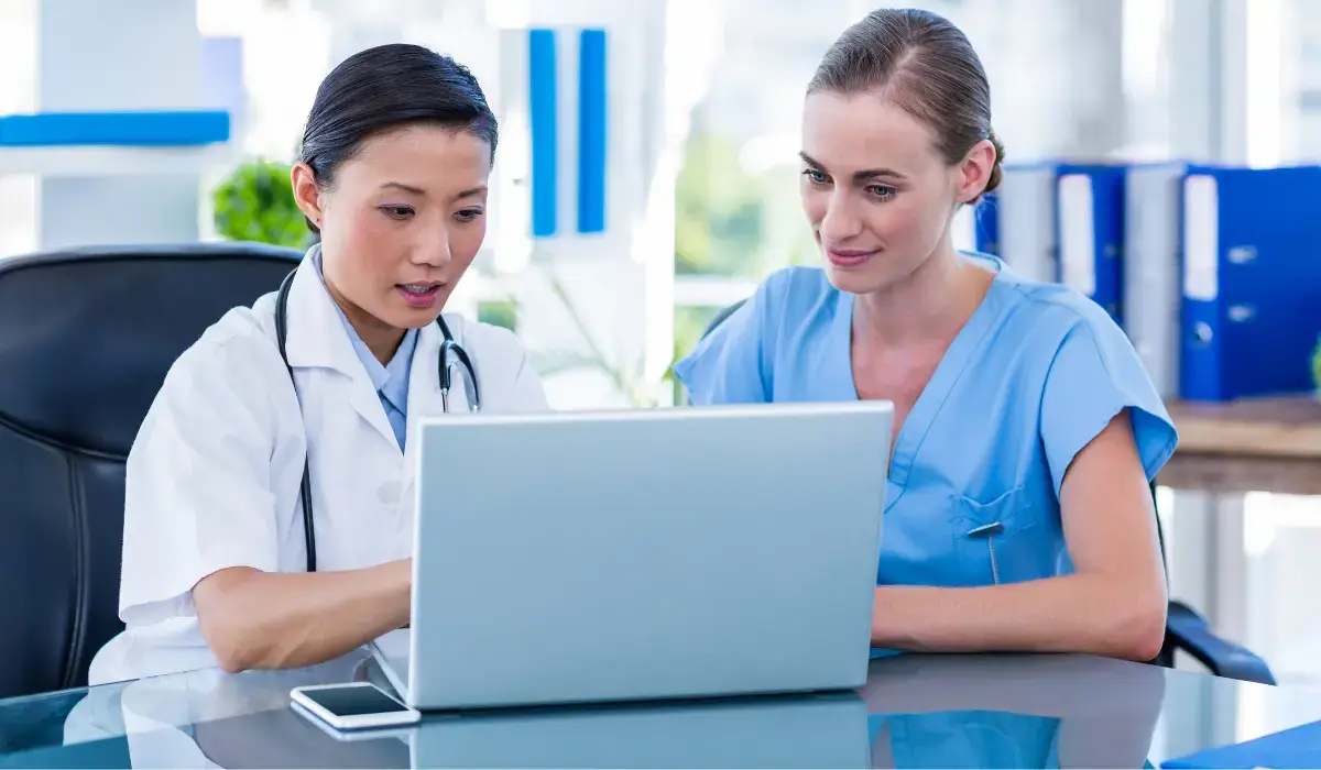 doctor-and-nurse-reviewing-charts