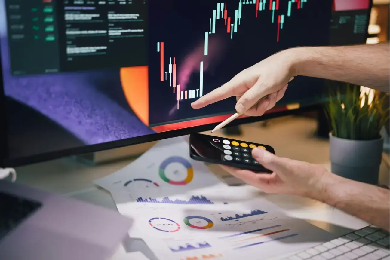 falls-and-rises-on-the-stock-exchange-hand-pointing-at-the-chart