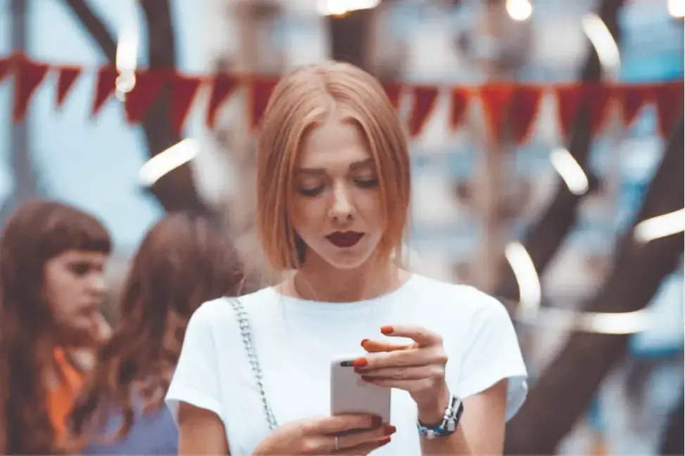 girl-looking-at-phone-screen