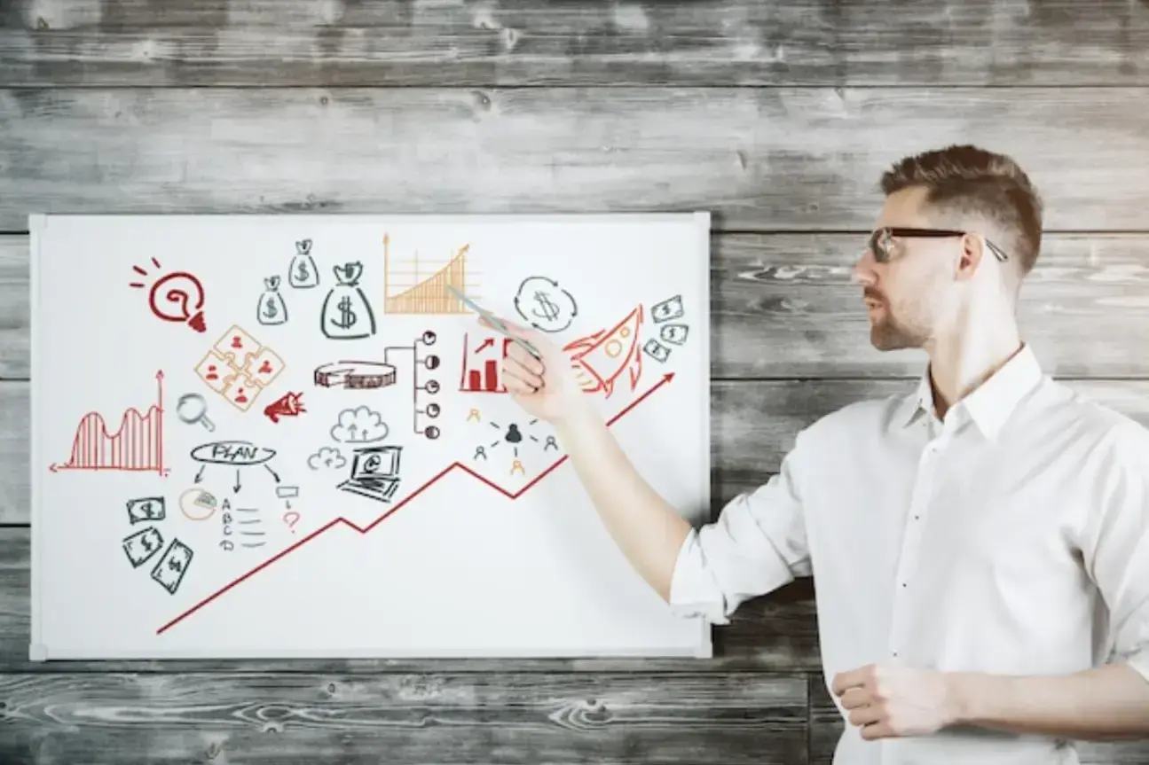 man-in-front-of-white-board
