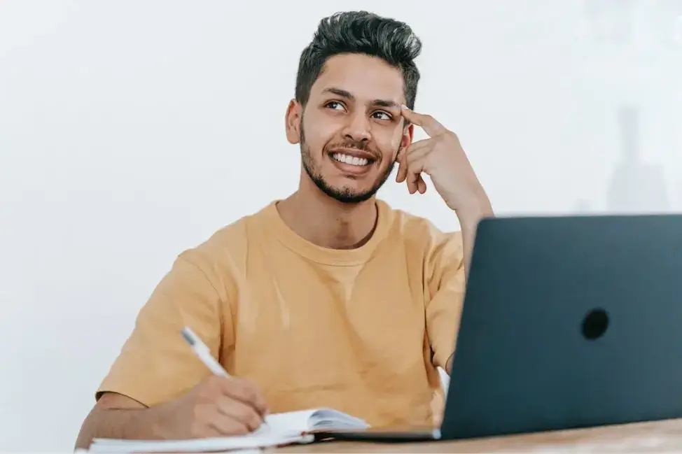 man-sitting-in-front-of-laptop