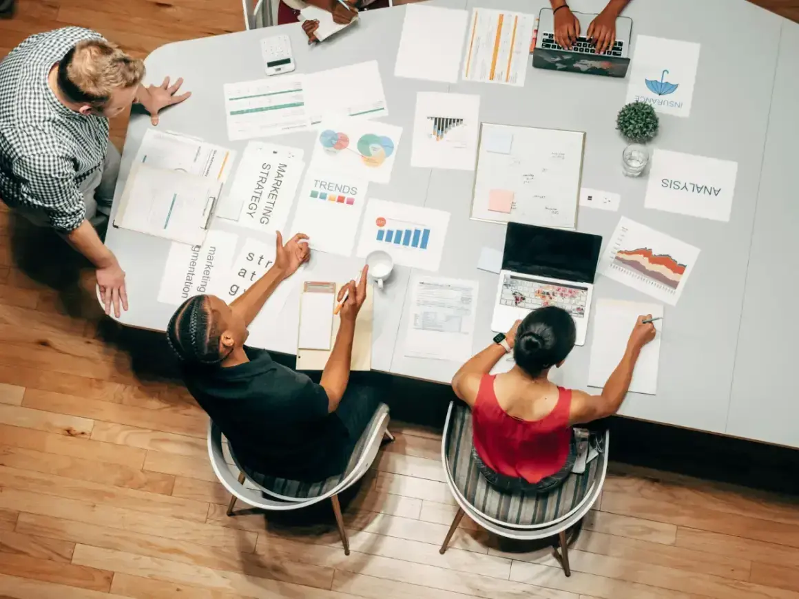overhead-shot-of-people-in-a-meeting