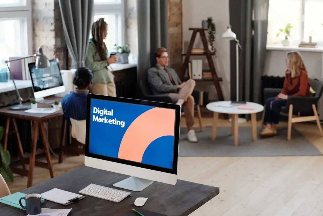 people-having-a-meeting-near-the-computer-on-the-table