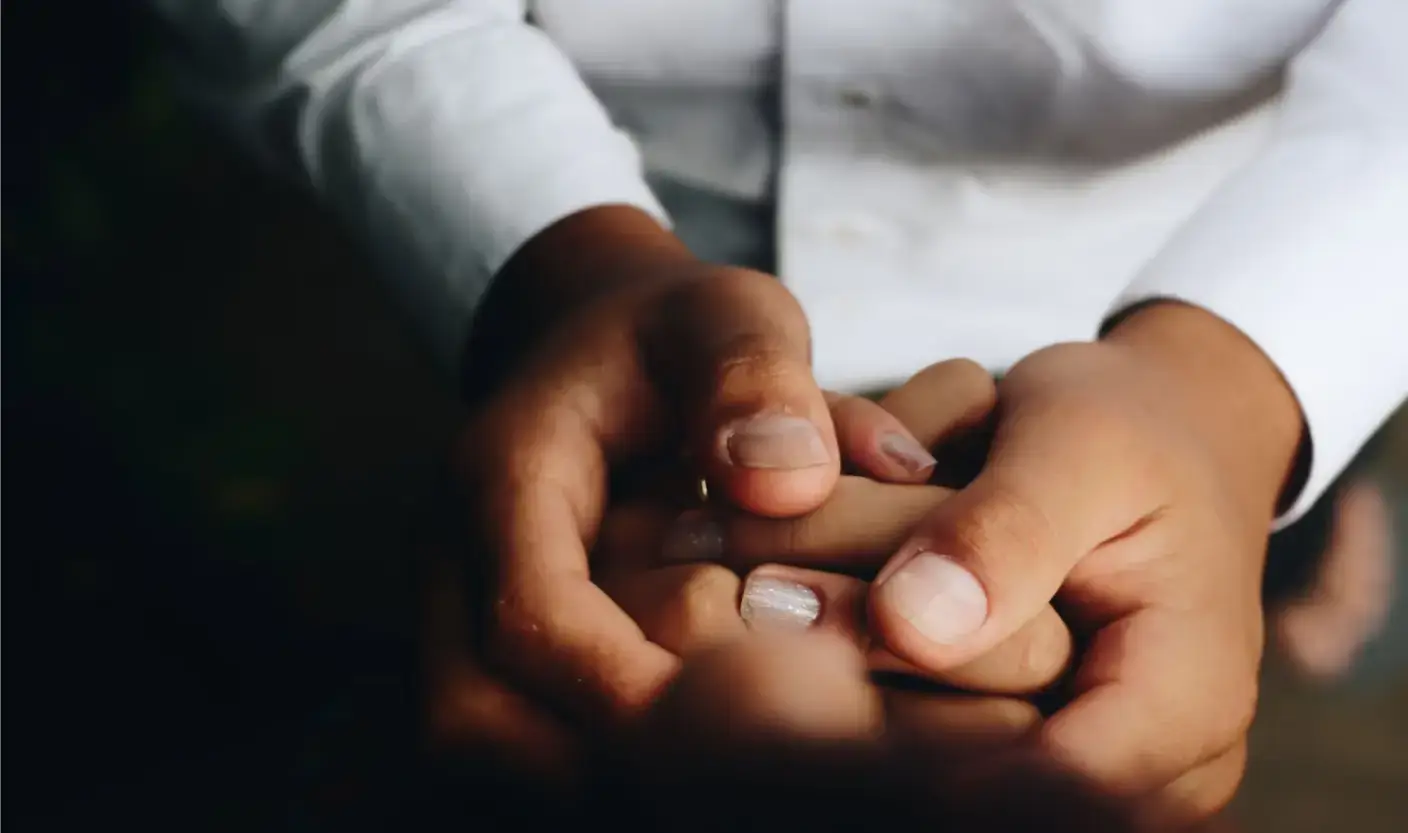 person-holding-hands