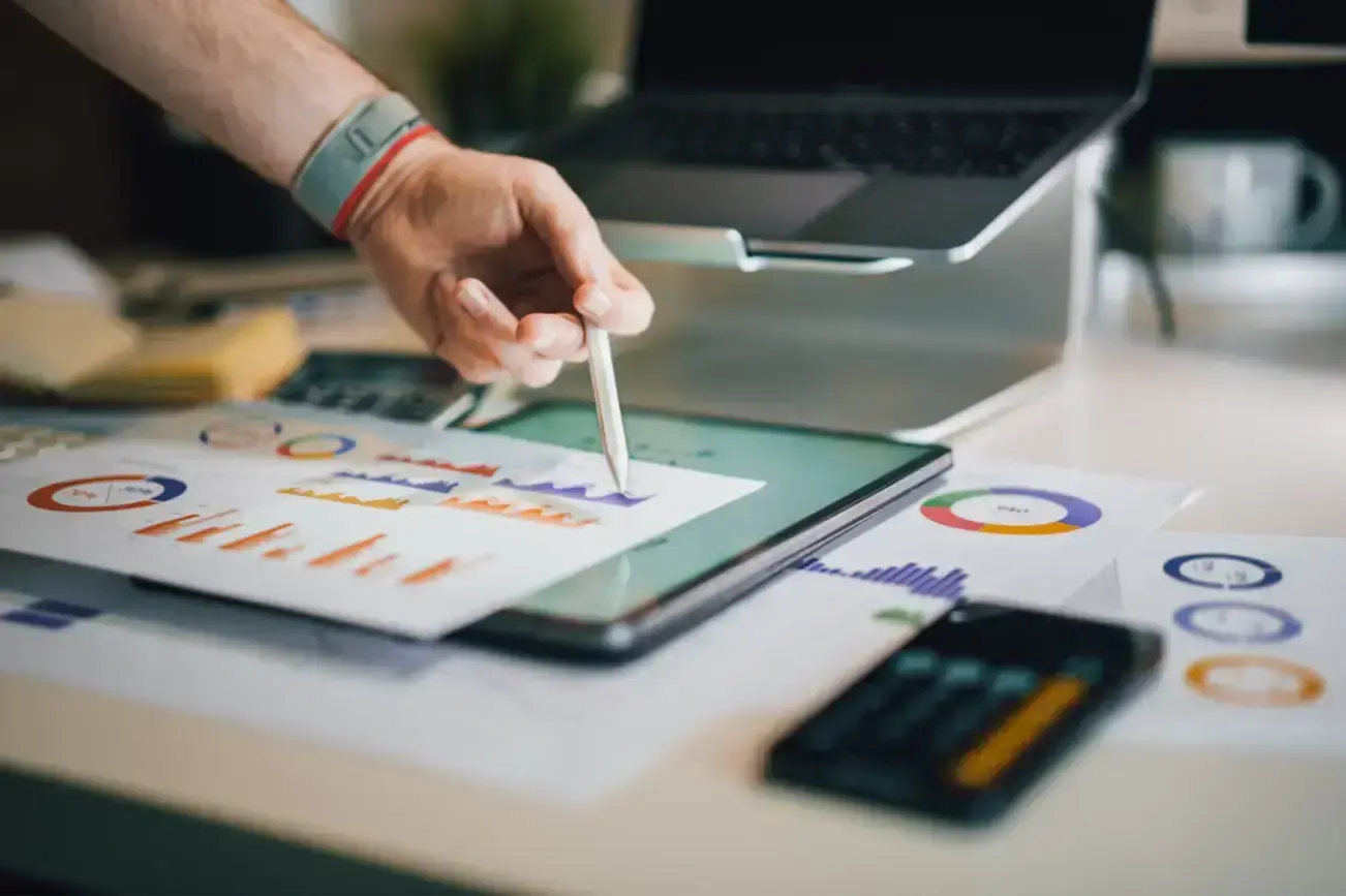 person-is-writing-on-a-piece-of-paper