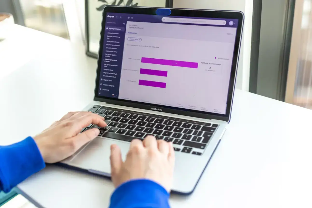 person-using-a-laptop-computer-on-a-desk
