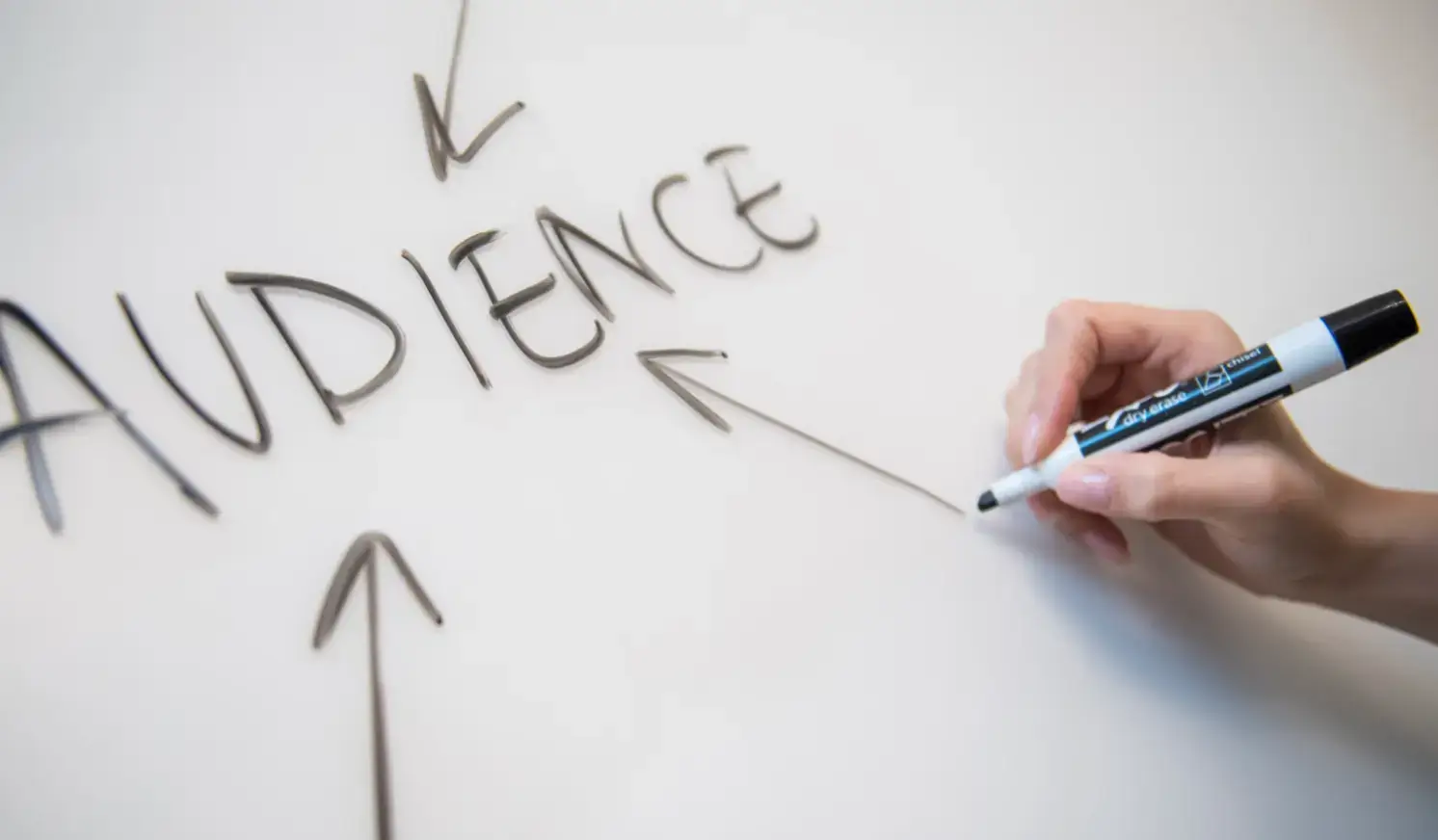 person-writing-on-white-paper-2