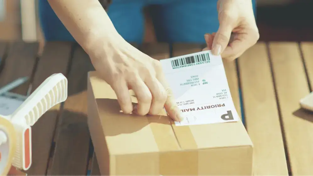 putting-label-on-box