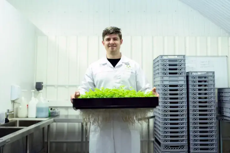 scientist-holding-crops-in-laboratory-1