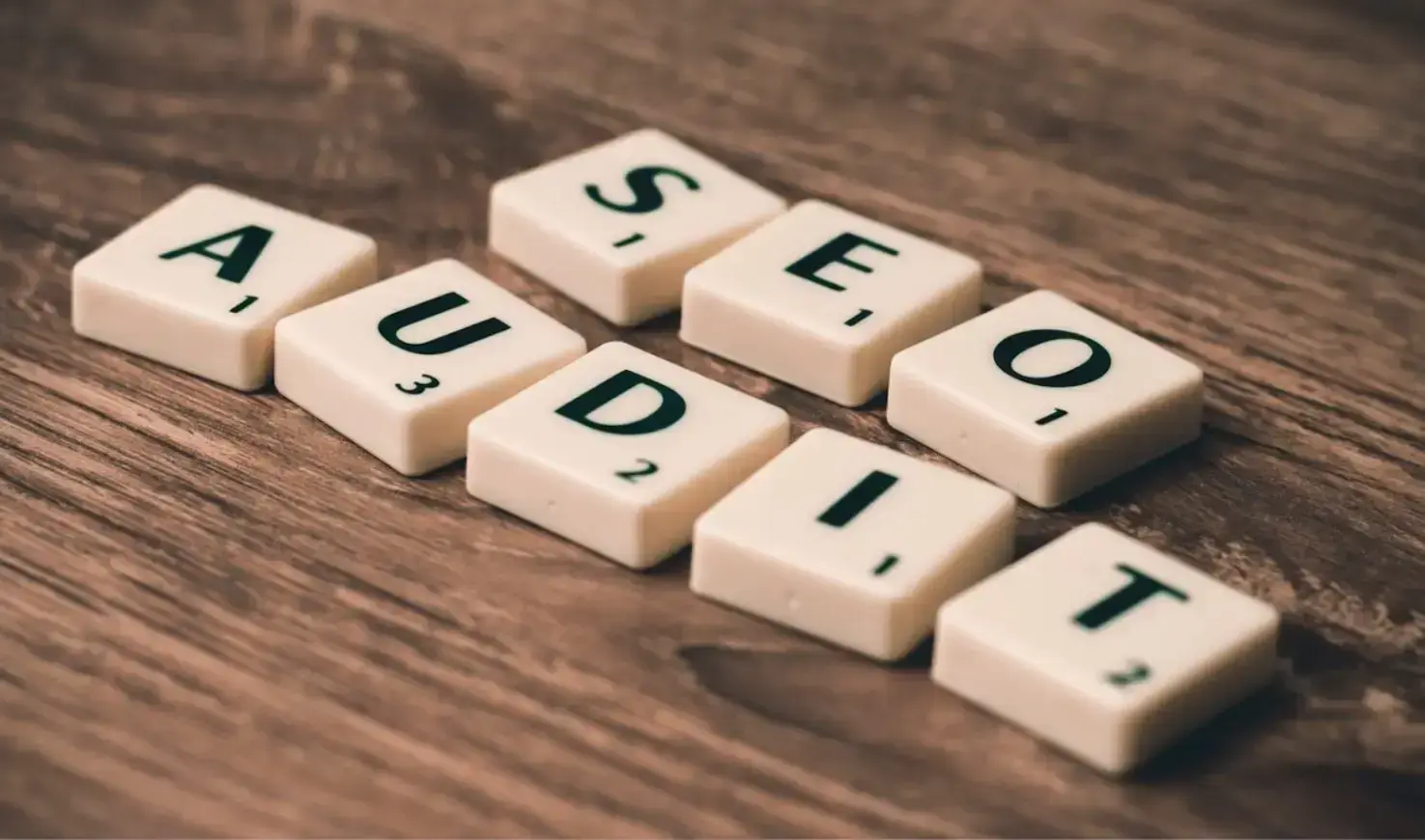 seo-audit-white-blocks-on-brown-wooden-surface
