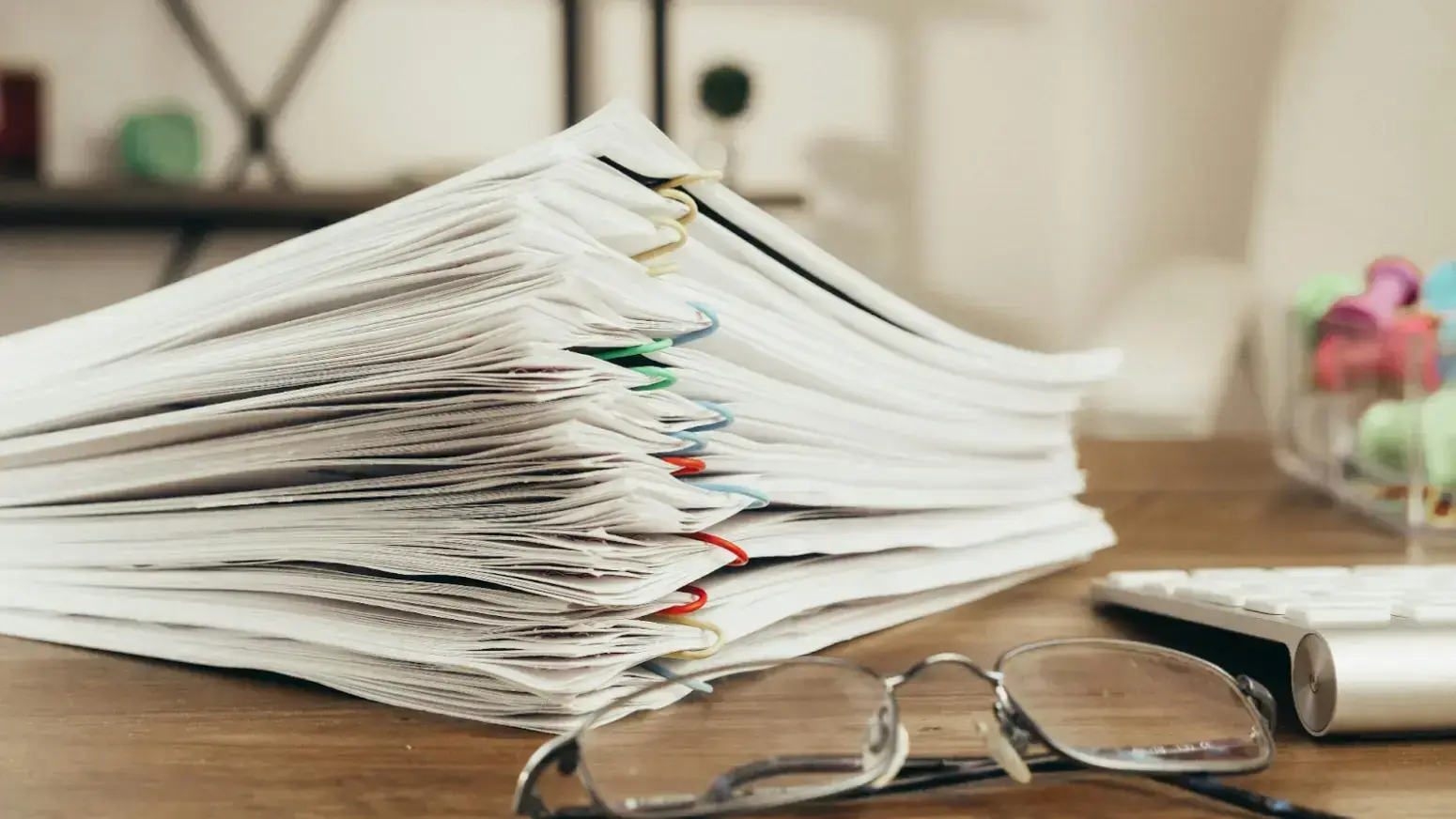 stack-of-documents-on-table