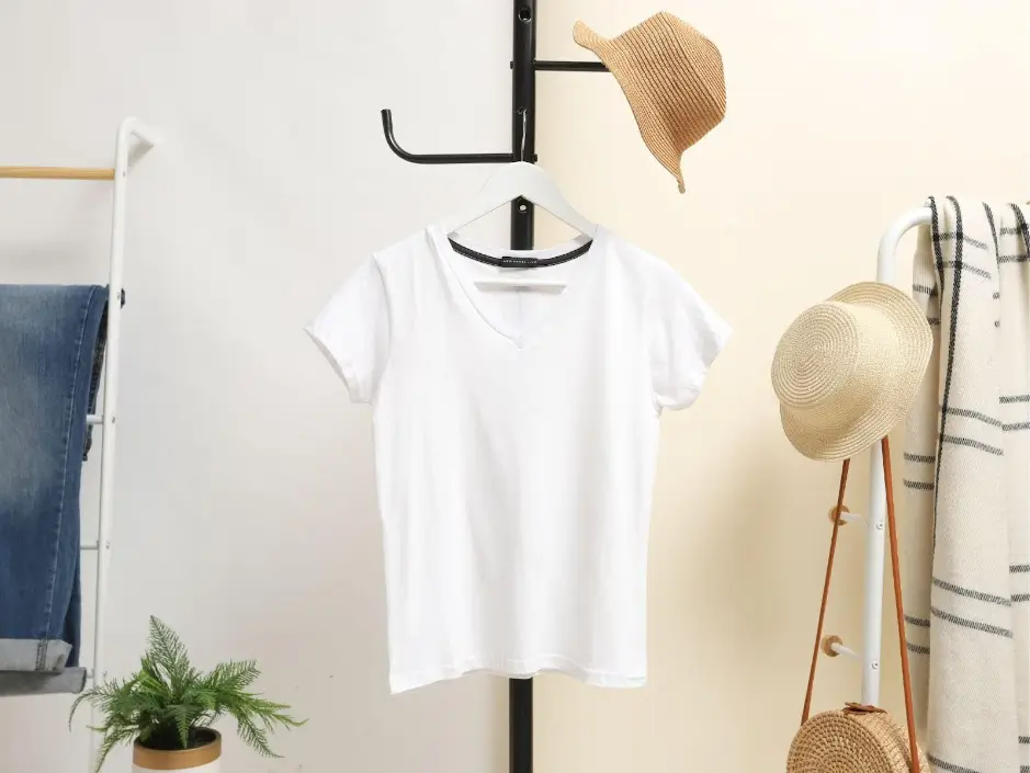 white-crew-neck-t-shirt-hanged-on-black-clothes-hanger