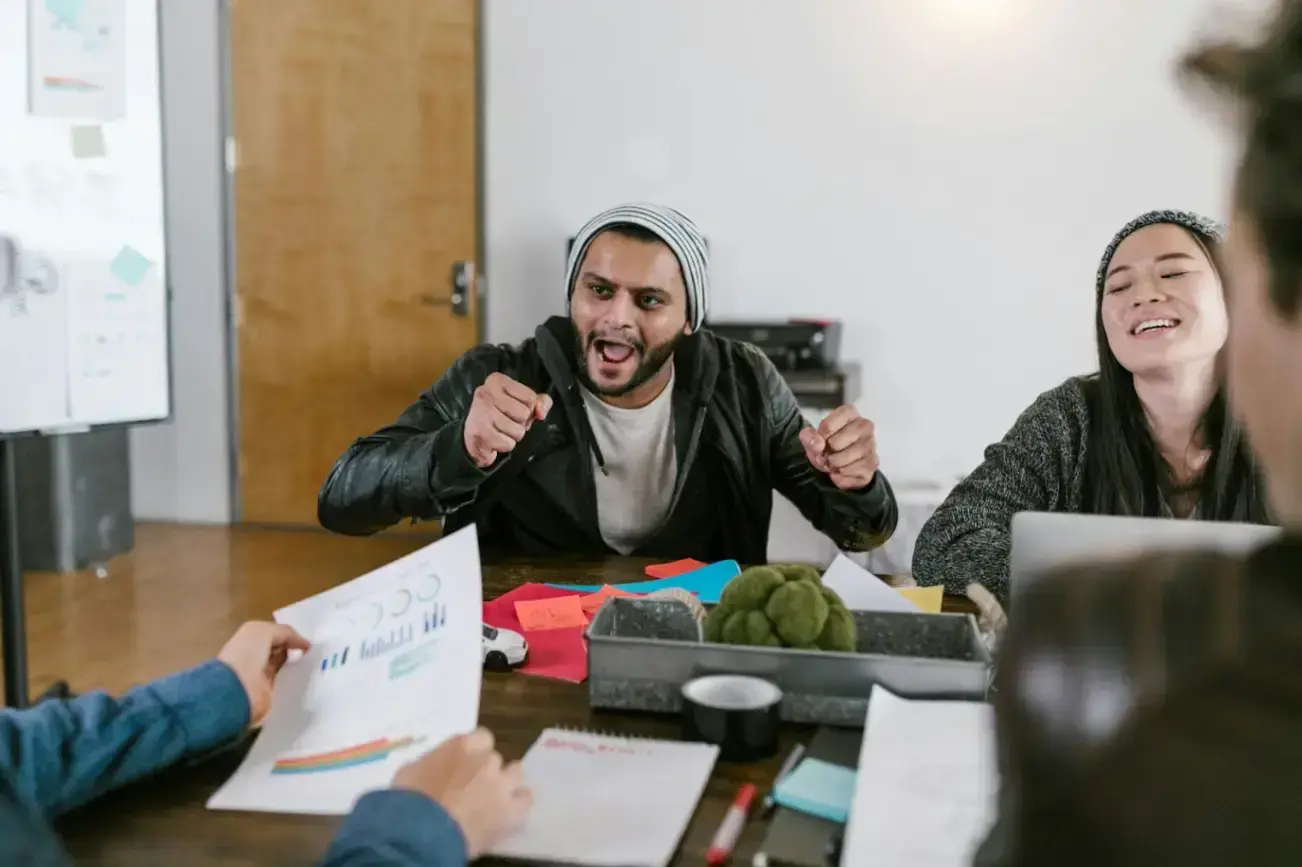 woman-in-black-jacket-sitting-beside-woman-in-gray-sweater
