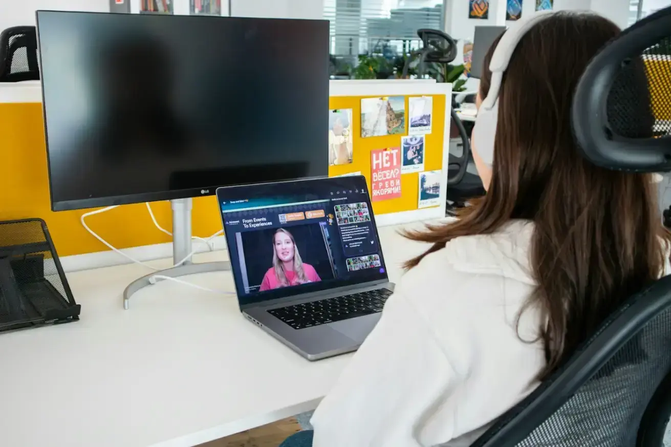 woman-sitting-in-front-of-a-computer-monitor