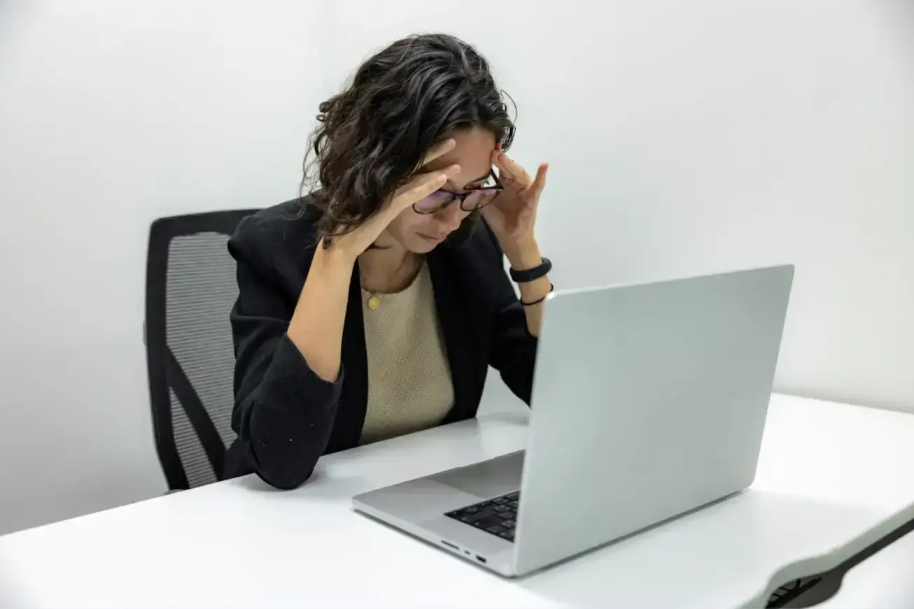 woman-sitting-in-front-of-a-laptop-computer