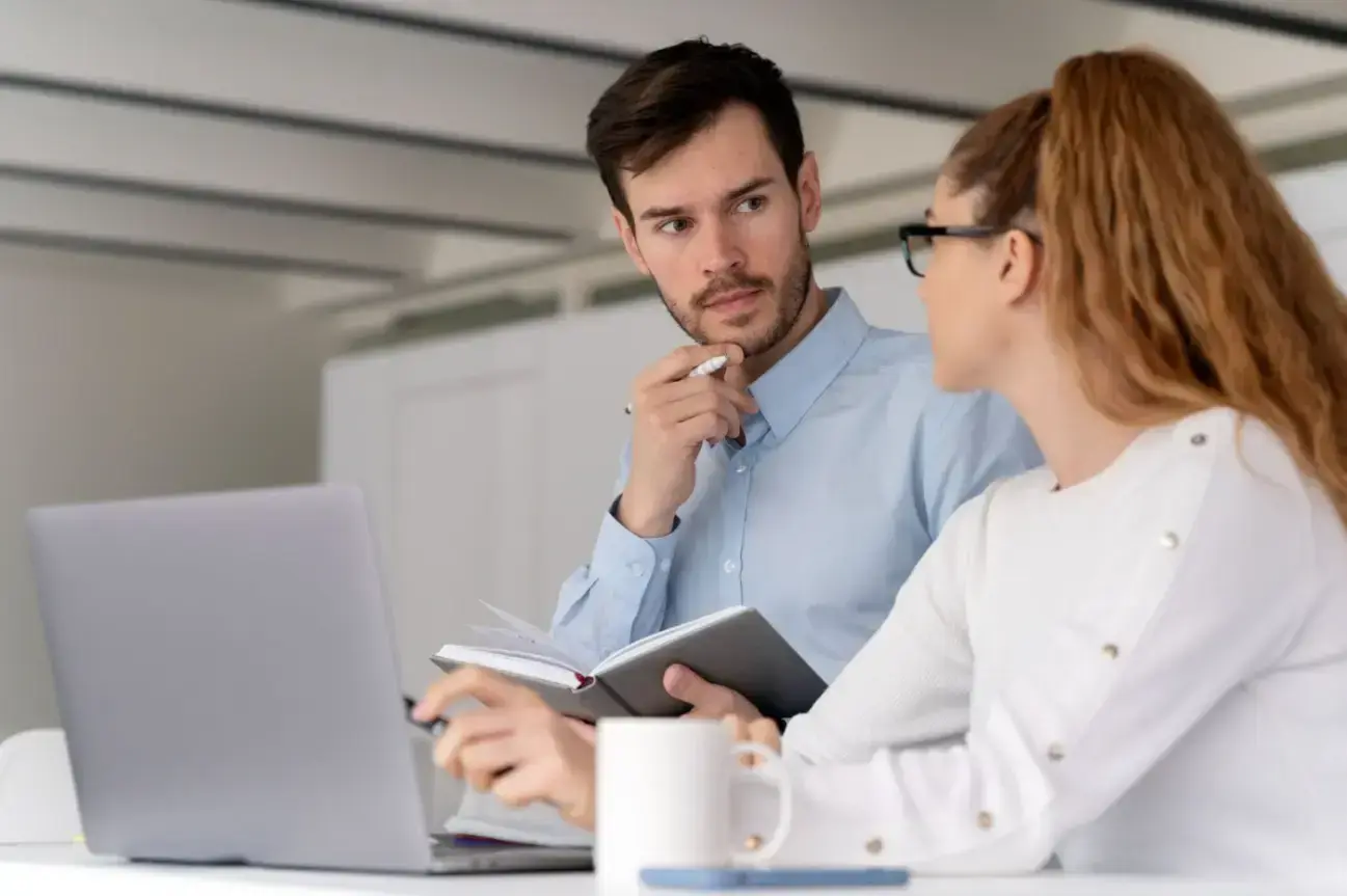 young-business-team-working-together-office